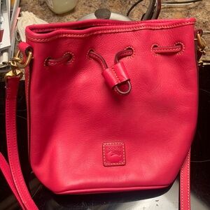 Brand New leather Dooney & Bourke drawstring crossbody
